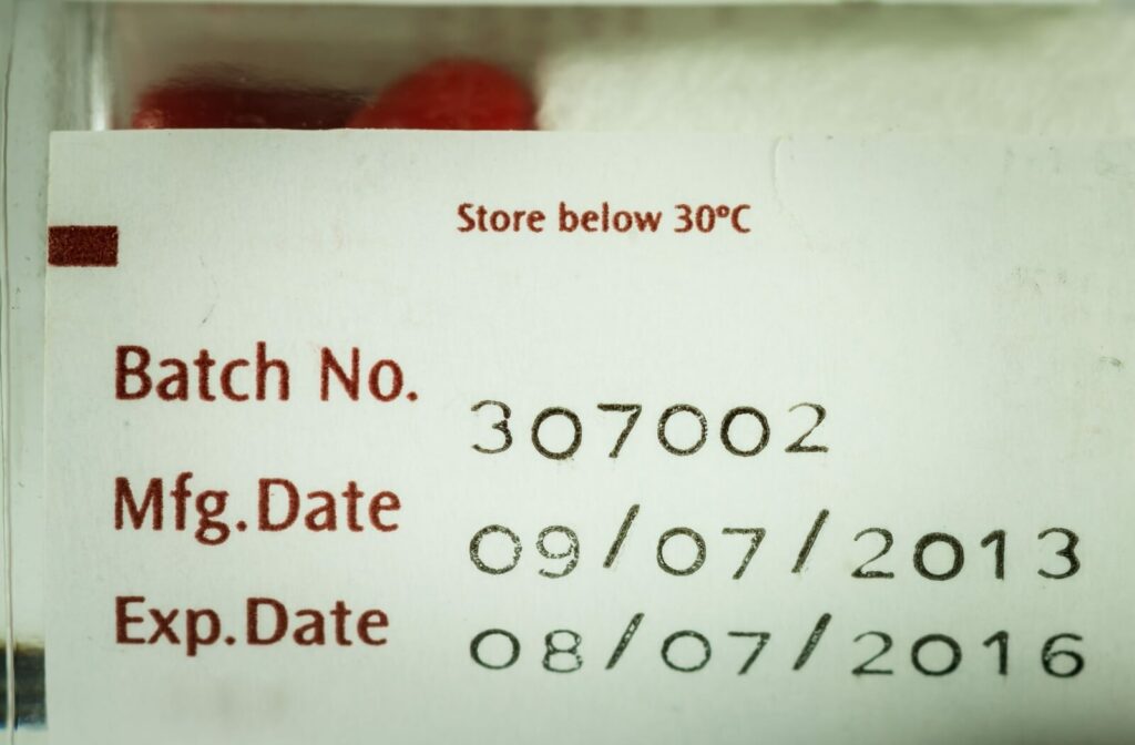 A label that displays batch number, manufacturing date and expiration dates of eye drop