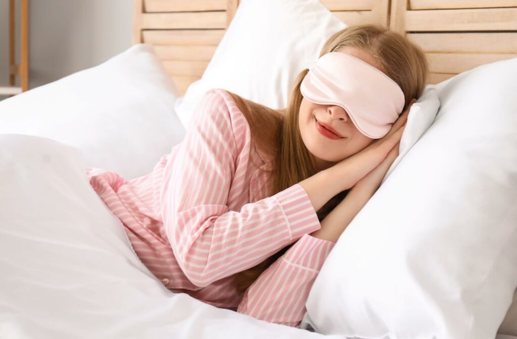 Someone rests after their cataract surgery, taking a nap.